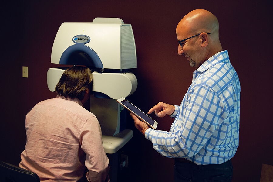 Dr. Sullivan Performing an Eye Exam